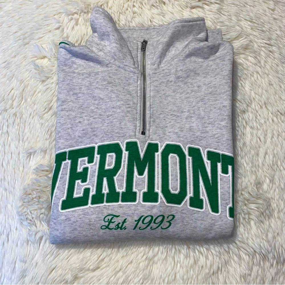 Half zip “Vermont” graphic sweatshirt.